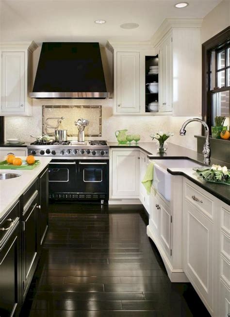 granite countertops white cabinets black stainless steel appliances|black pearl granite cabinets.